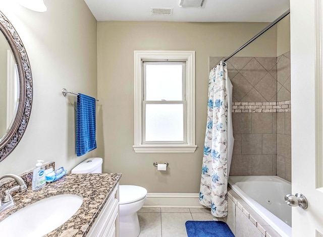 3139 Ridgeland Ave, Berwyn, IL 60402 - full bathroom featuring vanity, tile patterned flooring, and tiled shower / bath combo