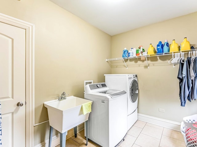 3139 Ridgeland Ave, Berwyn, IL 60402 - washroom with washing machine and dryer and light tile patterned flooring