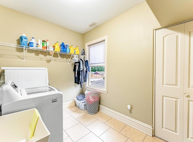 3139 Ridgeland Ave, Berwyn, IL 60402 - washroom with separate washer and dryer and light tile patterned floors