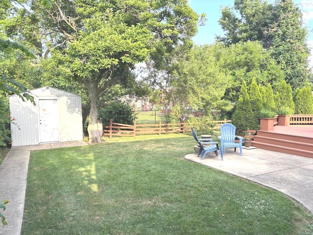 1933 Birch St, Des Plaines, IL 60018 - view of yard with a shed, a patio, and a deck