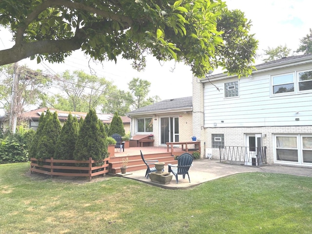 1933 Birch St, Des Plaines, IL 60018 - back of house featuring a wooden deck, a patio area, brick siding, and a yard