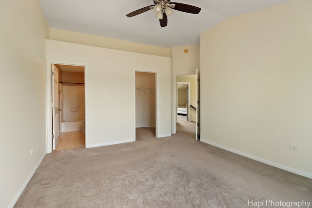 548 Legend Ln, Mchenry, IL 60050 - unfurnished bedroom featuring carpet flooring, a spacious closet, ensuite bath, and lofted ceiling