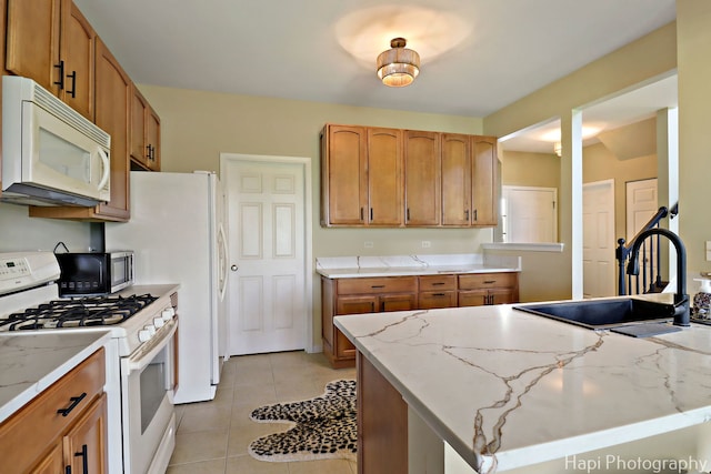548 Legend Ln, Mchenry, IL 60050 - kitchen featuring white appliances, light tile patterned flooring, and light stone countertops