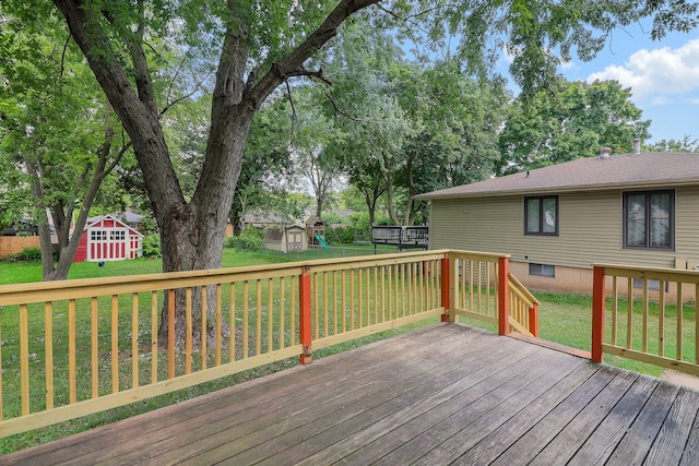 528 5th St, Aurora, IL 60505 - wooden deck featuring a shed and a lawn