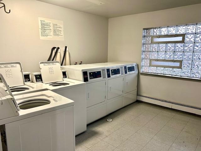 2B Dundee Quarter Unit 101, Palatine, IL 60074 - community laundry room featuring washer and clothes dryer and baseboard heating