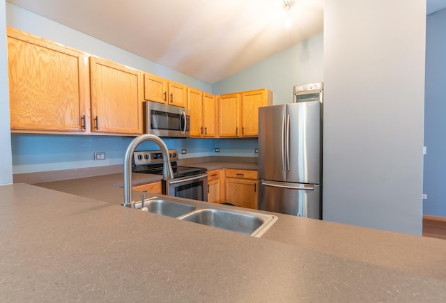 1521 Silverstone Dr Unit 3, Carpentersville, IL 60110 - kitchen featuring appliances with stainless steel finishes, vaulted ceiling, and light brown cabinetry