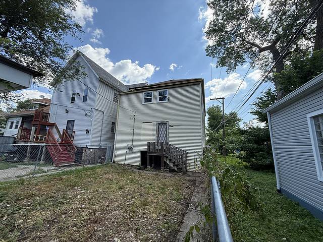 6044 S Justine St, Chicago, IL 60636 - rear view of house with stairs