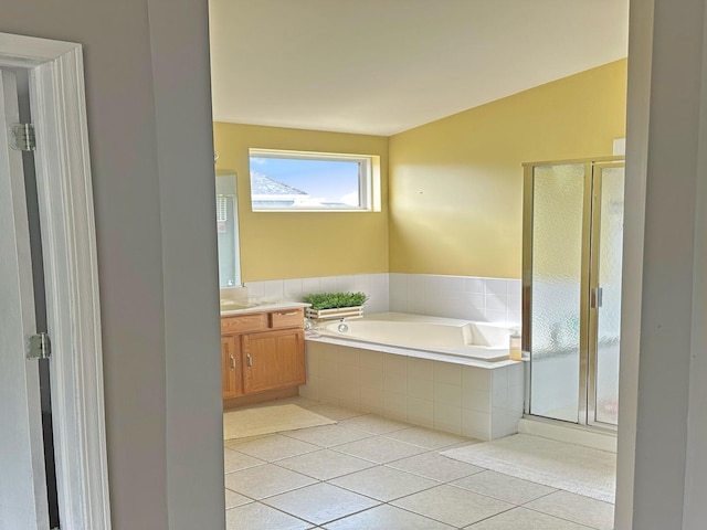 6814 Sahara Dr, Plainfield, IL 60586 - bathroom featuring vanity, a bath, a stall shower, and tile patterned flooring