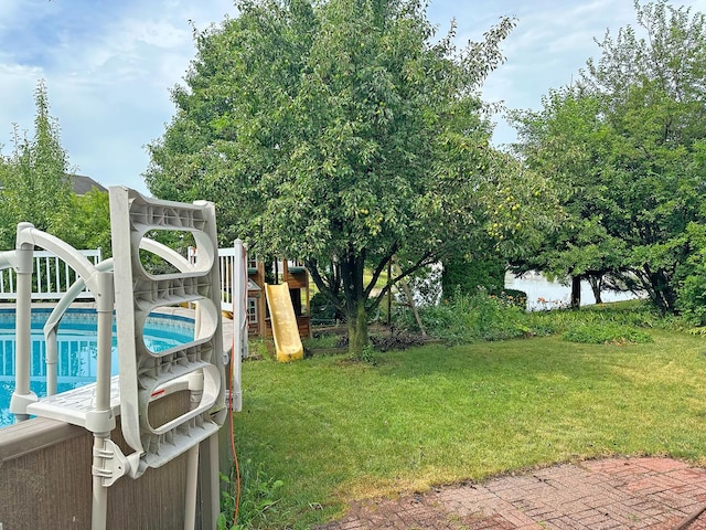 6814 Sahara Dr, Plainfield, IL 60586 - view of green lawn with an outdoor pool