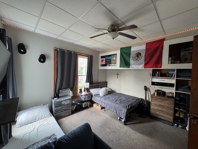 368 N Hickory St, Joliet, IL 60435 - carpeted bedroom with a paneled ceiling and a ceiling fan