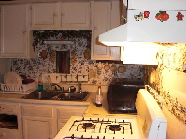 513 Overland Trl, Rockford, IL 61101 - kitchen featuring exhaust hood, light countertops, and tasteful backsplash