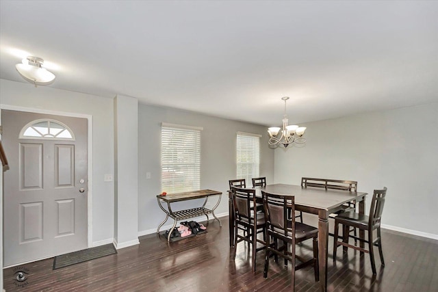 1112 Kim Ct, Joliet, IL 60431 - dining room featuring dark wood-type flooring, plenty of natural light, and a chandelier