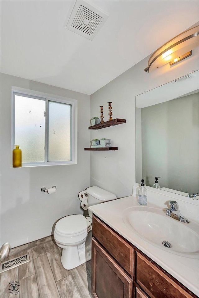1112 Kim Ct, Joliet, IL 60431 - bathroom featuring vanity and wood finished floors