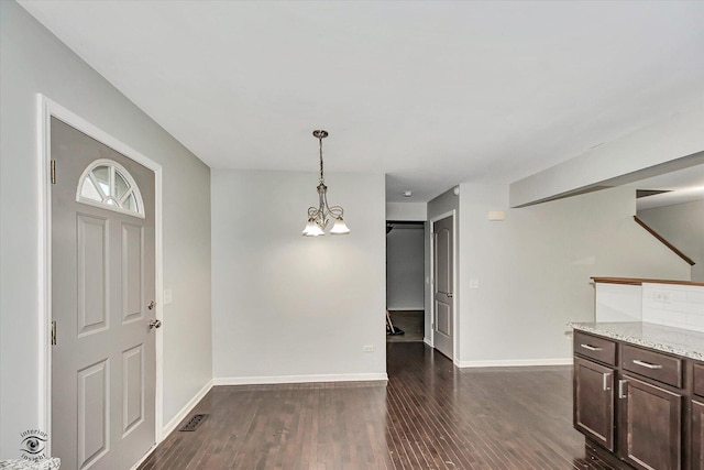 1112 Kim Ct, Joliet, IL 60431 - entrance foyer with dark wood finished floors and a chandelier
