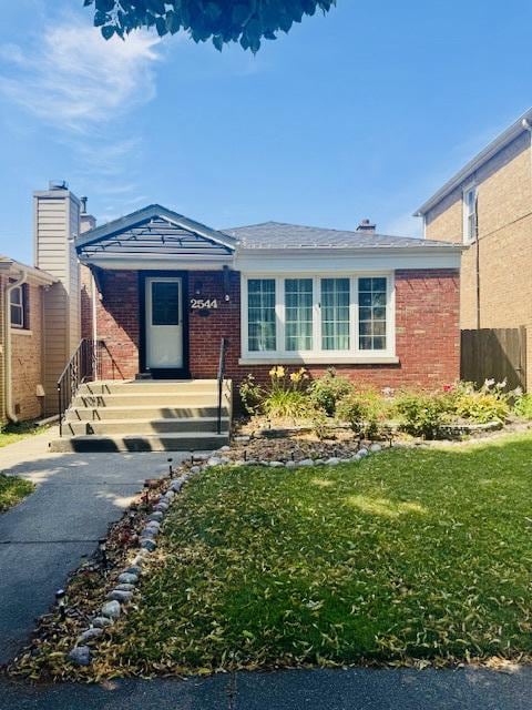2544 W 107th St, Chicago, IL 60655 - view of front of home featuring brick siding and a front lawn