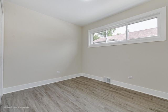 15223 Cottage Grove Ave, Dolton, IL 60419 - unfurnished room with wood finished floors and baseboards
