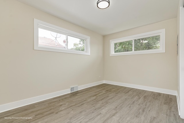 15223 Cottage Grove Ave, Dolton, IL 60419 - spare room with wood finished floors and baseboards