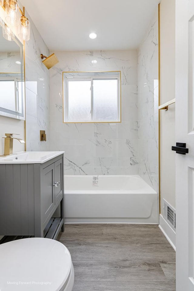 15223 Cottage Grove Ave, Dolton, IL 60419 - bathroom with vanity, bathing tub / shower combination, wood finished floors, and recessed lighting