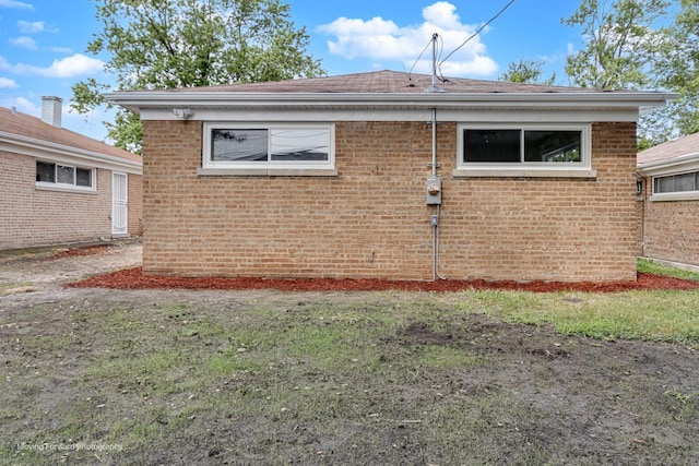 15223 Cottage Grove Ave, Dolton, IL 60419 - rear view of house with brick siding and roof with shingles
