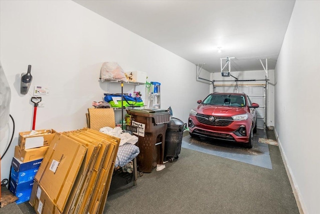 2201 Concord Dr Unit 2201, Mchenry, IL 60050 - garage featuring baseboards and a garage door opener