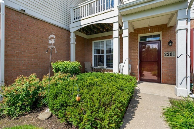 2201 Concord Dr Unit 2201, Mchenry, IL 60050 - entrance to property featuring brick siding and a balcony
