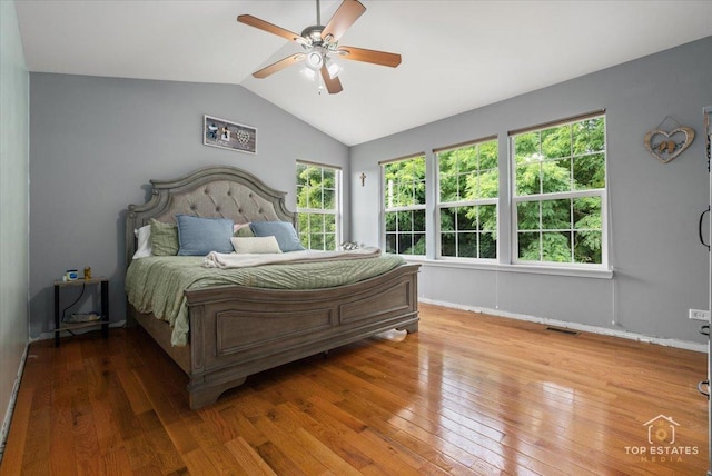 2039 Muirfield Dr, Yorkville, IL 60560 - bedroom with hardwood / wood-style floors, vaulted ceiling, and ceiling fan