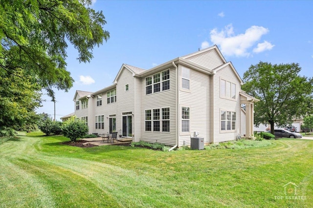 2039 Muirfield Dr, Yorkville, IL 60560 - back of property with a patio area and a yard