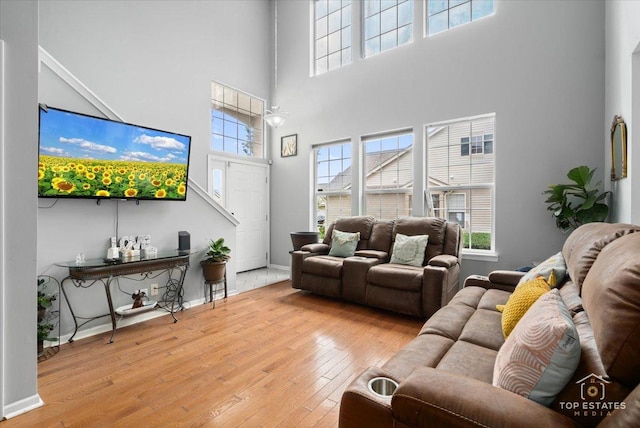 2039 Muirfield Dr, Yorkville, IL 60560 - living room with a towering ceiling, hardwood / wood-style floors, and plenty of natural light