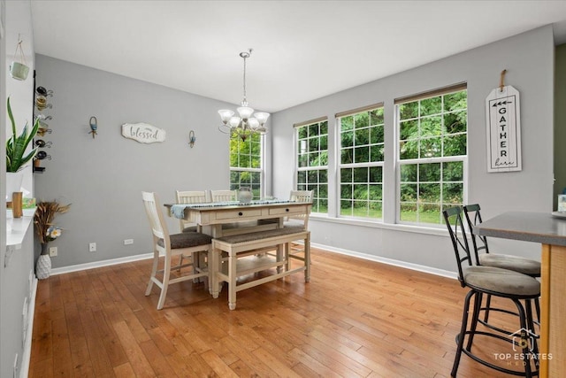 2039 Muirfield Dr, Yorkville, IL 60560 - dining space featuring a chandelier and light wood-type flooring