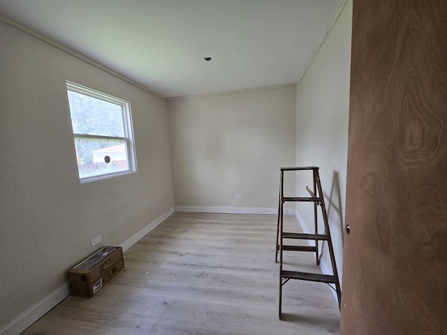 426 N Trumbull Ave, Chicago, IL 60624 - spare room with light wood-type flooring and baseboards