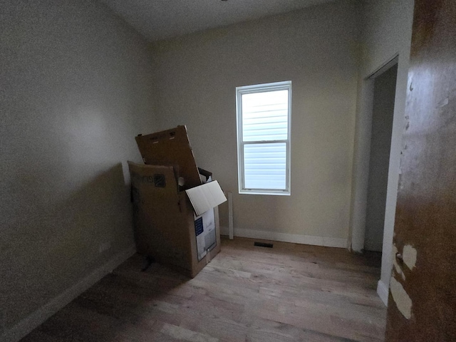 426 N Trumbull Ave, Chicago, IL 60624 - unfurnished room featuring wood finished floors and baseboards