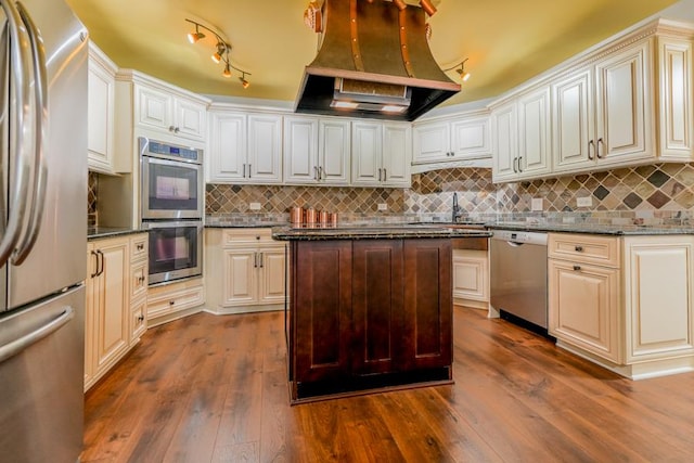 1401 Burr Oak Rd Unit 108B, Hinsdale, IL 60521 - kitchen featuring stainless steel appliances, range hood, dark wood finished floors, and tasteful backsplash