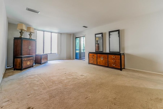 1401 Burr Oak Rd Unit 108B, Hinsdale, IL 60521 - unfurnished living room featuring carpet