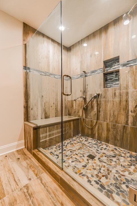 1401 Burr Oak Rd Unit 108B, Hinsdale, IL 60521 - bathroom featuring a shower stall and baseboards