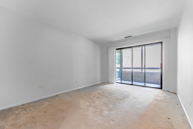 1401 Burr Oak Rd Unit 108B, Hinsdale, IL 60521 - unfurnished room with light carpet and baseboards