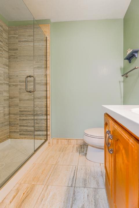 1401 Burr Oak Rd Unit 108B, Hinsdale, IL 60521 - bathroom featuring vanity and a stall shower