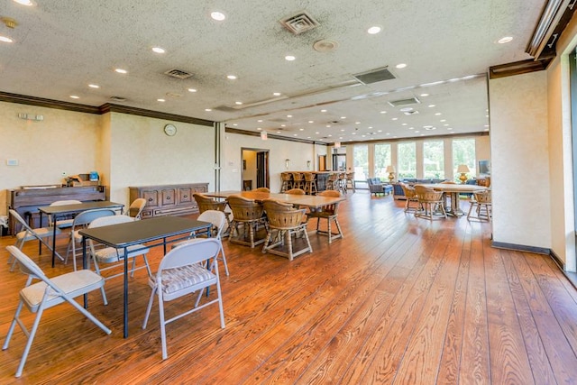 1401 Burr Oak Rd Unit 108B, Hinsdale, IL 60521 - dining room with ornamental molding, wood-type flooring, and recessed lighting