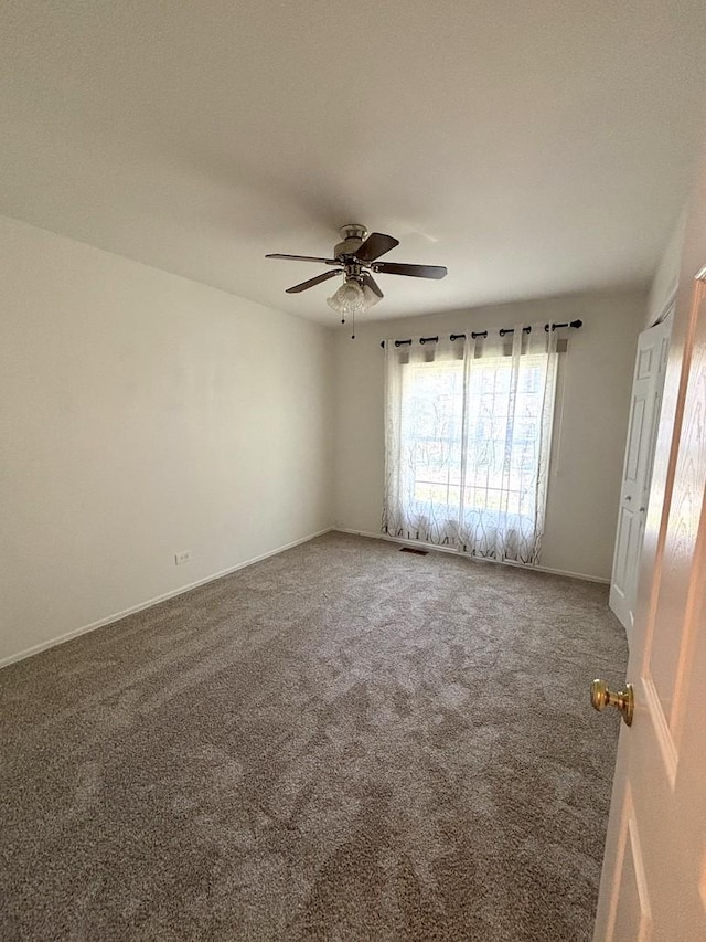2S651 Ashley Dr, Glen Ellyn, IL 60137 - unfurnished room with carpet floors and a ceiling fan