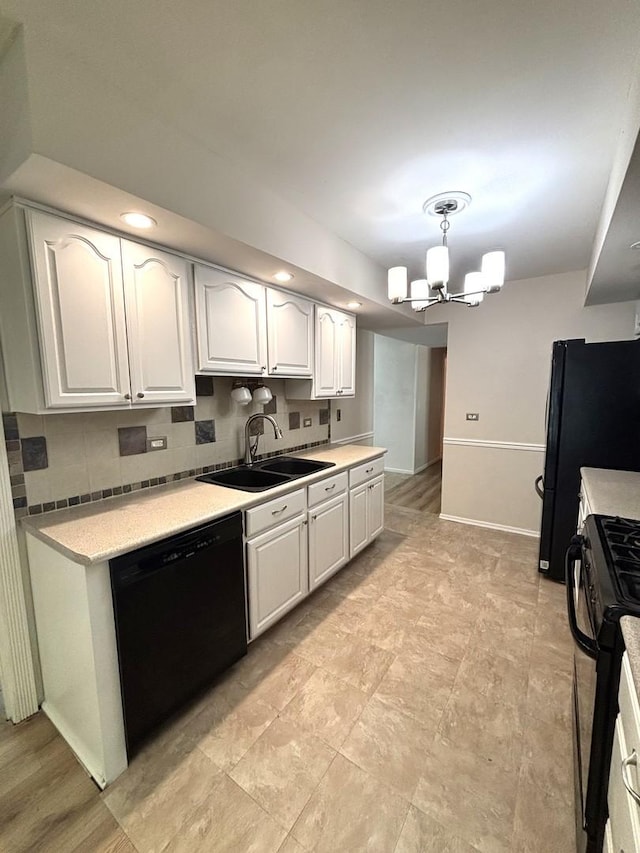 2S651 Ashley Dr, Glen Ellyn, IL 60137 - kitchen featuring black appliances, a chandelier, light countertops, white cabinets, and recessed lighting
