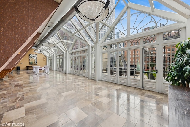 111 E Chestnut St Unit 21B, Chicago, IL 60611 - unfurnished sunroom featuring french doors, plenty of natural light, and lofted ceiling