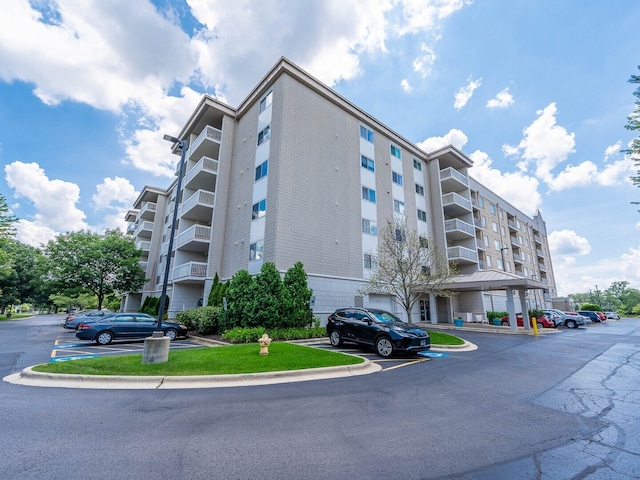 2020 Saint Regis Dr Unit 501, Lombard, IL 60148 - view of apartment building / complex with uncovered parking