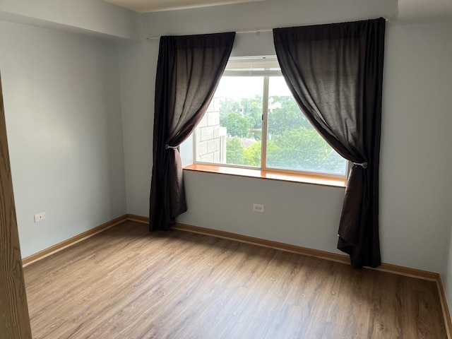 2020 Saint Regis Dr Unit 501, Lombard, IL 60148 - unfurnished room featuring wood finished floors and baseboards