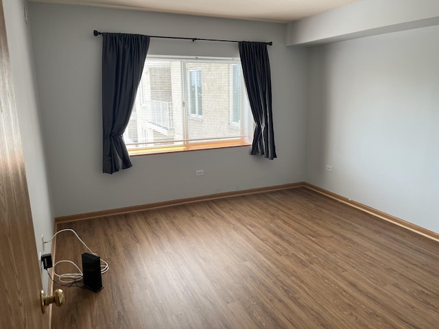 2020 Saint Regis Dr Unit 501, Lombard, IL 60148 - unfurnished room with wood finished floors and baseboards