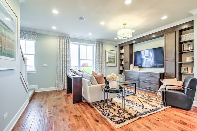 1552 Times Dr, Des Plaines, IL 60018 - living area featuring ornamental molding, healthy amount of natural light, light wood finished floors, recessed lighting, and built in features