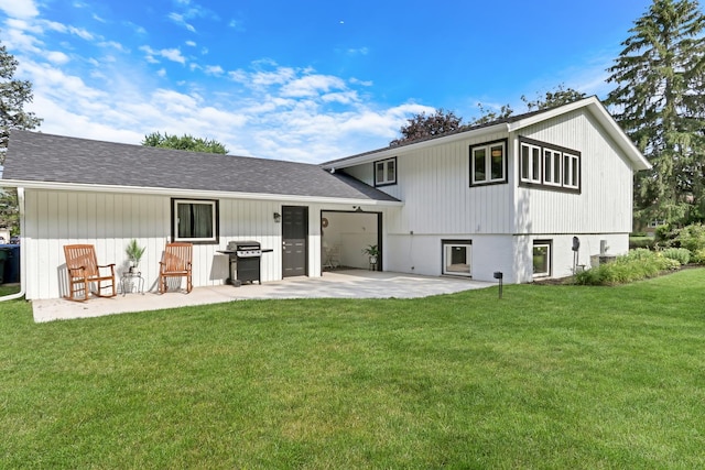 31340 N Liberty Rd, Grayslake, IL 60030 - rear view of house with a patio area, a lawn, and roof with shingles