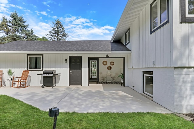 31340 N Liberty Rd, Grayslake, IL 60030 - entrance to property featuring a shingled roof and a patio