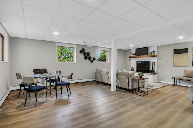 31340 N Liberty Rd, Grayslake, IL 60030 - living area with wood finished floors, a paneled ceiling, and a fireplace