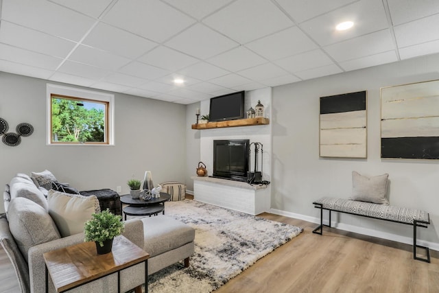 31340 N Liberty Rd, Grayslake, IL 60030 - living area featuring a drop ceiling, wood finished floors, and a fireplace
