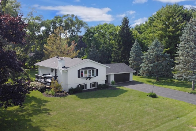 31340 N Liberty Rd, Grayslake, IL 60030 - view of front facade with asphalt driveway, a front lawn, and a garage