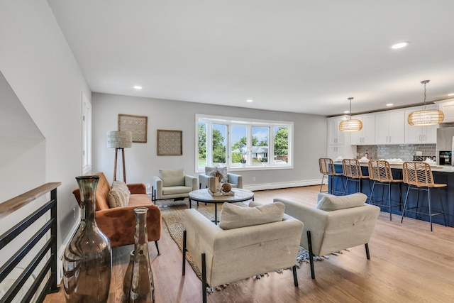 31340 N Liberty Rd, Grayslake, IL 60030 - living area with light wood-style floors, a baseboard heating unit, and recessed lighting